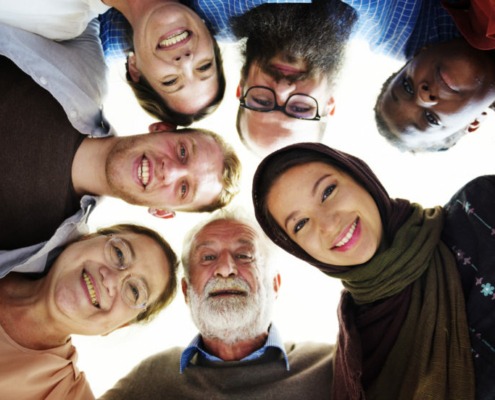 Diverse group of faces in a circle