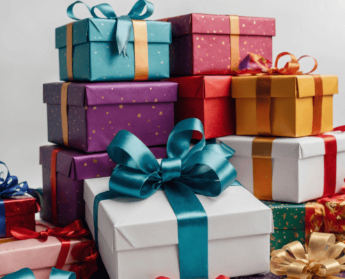 Gift boxes of all colors and sizes stacked up on top of each other with bows; calling to reflect on the spiritual impact of gift-giving in excess.
