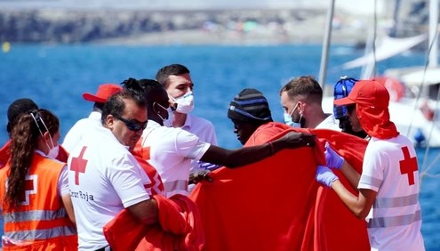 Migrant receives assistance emphasizing importance of assisting poor and vulnerable