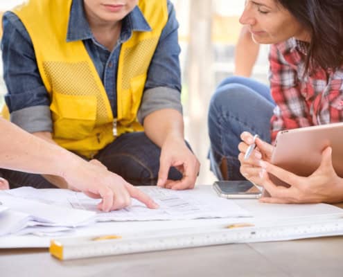People working together on construction plans