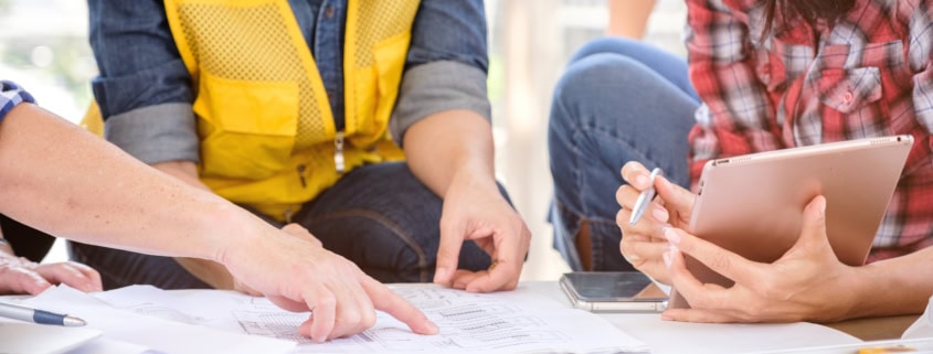People working together on construction plans
